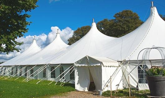 multiple portable restrooms for large-scale outdoor events, ensuring availability for all guests in Bartlett